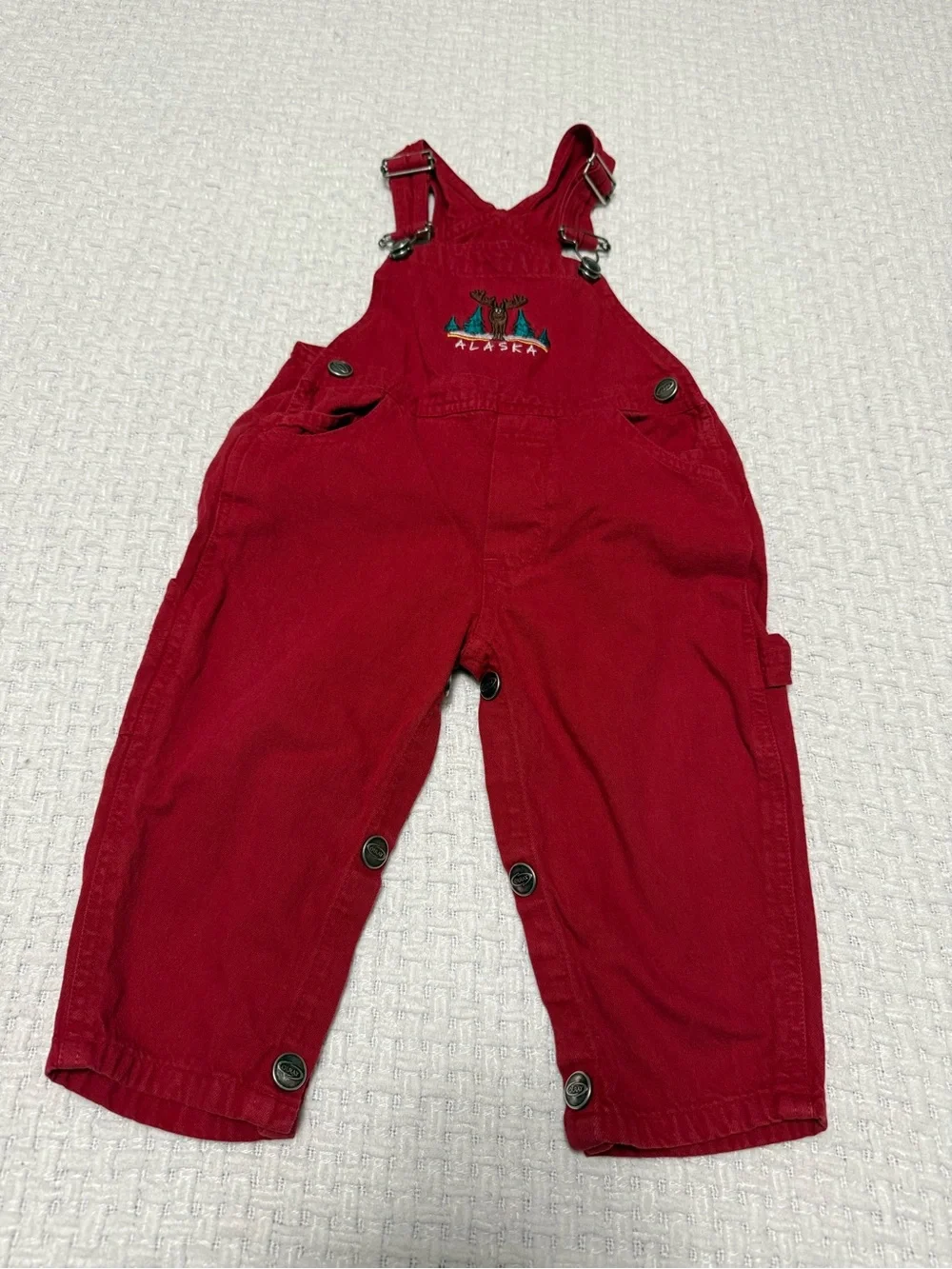 Red Alaska vintage overalls with embroidered moose and trees, 1 year.